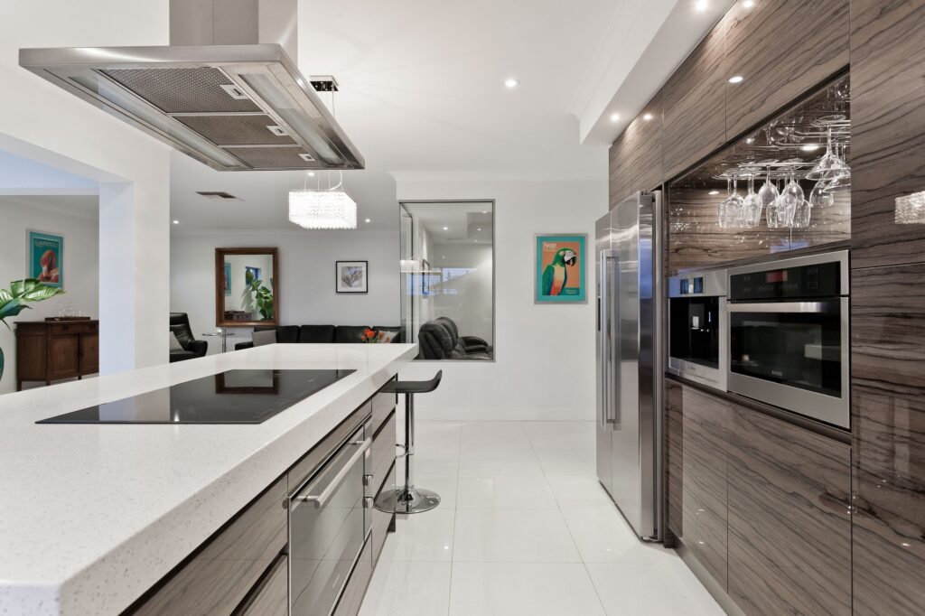 a modern kitchen with stainless steel appliances